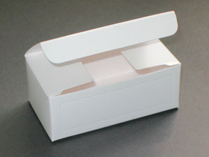 White cardboard takeaway box with lid half open