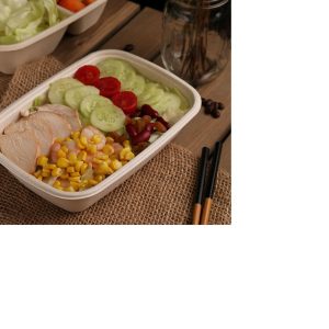 Brown salad tub with divider in the middle with food inside